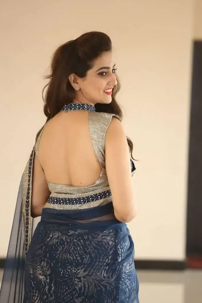 TV Anchor Manjusha Back Showing Images In Blue Saree